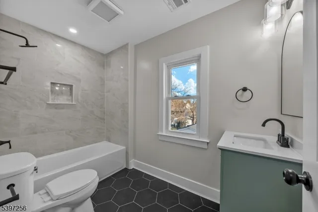 $899,000 | 68 Cathedral Avenue, Nutley, NJ 07110