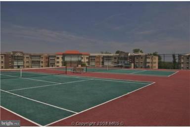 19355 Cypress Ridge Terrace, Unit 807 Leesburg, VA 20176 - Photo 18 of 29 a view of a tennis court