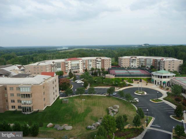 19355 Cypress Ridge Terrace, Unit 807 Leesburg, VA 20176 - Photo 19 of 29 a view of residential houses with outdoor space and swimming pool