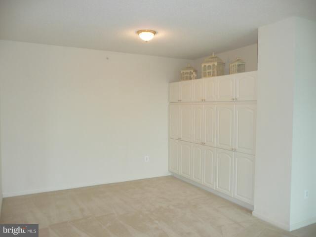 19355 Cypress Ridge Terrace, Unit 807 Leesburg, VA 20176 - Photo 5 of 29 a view of an empty room