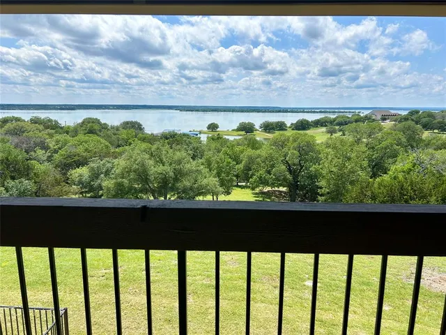 a view of a street from a balcony