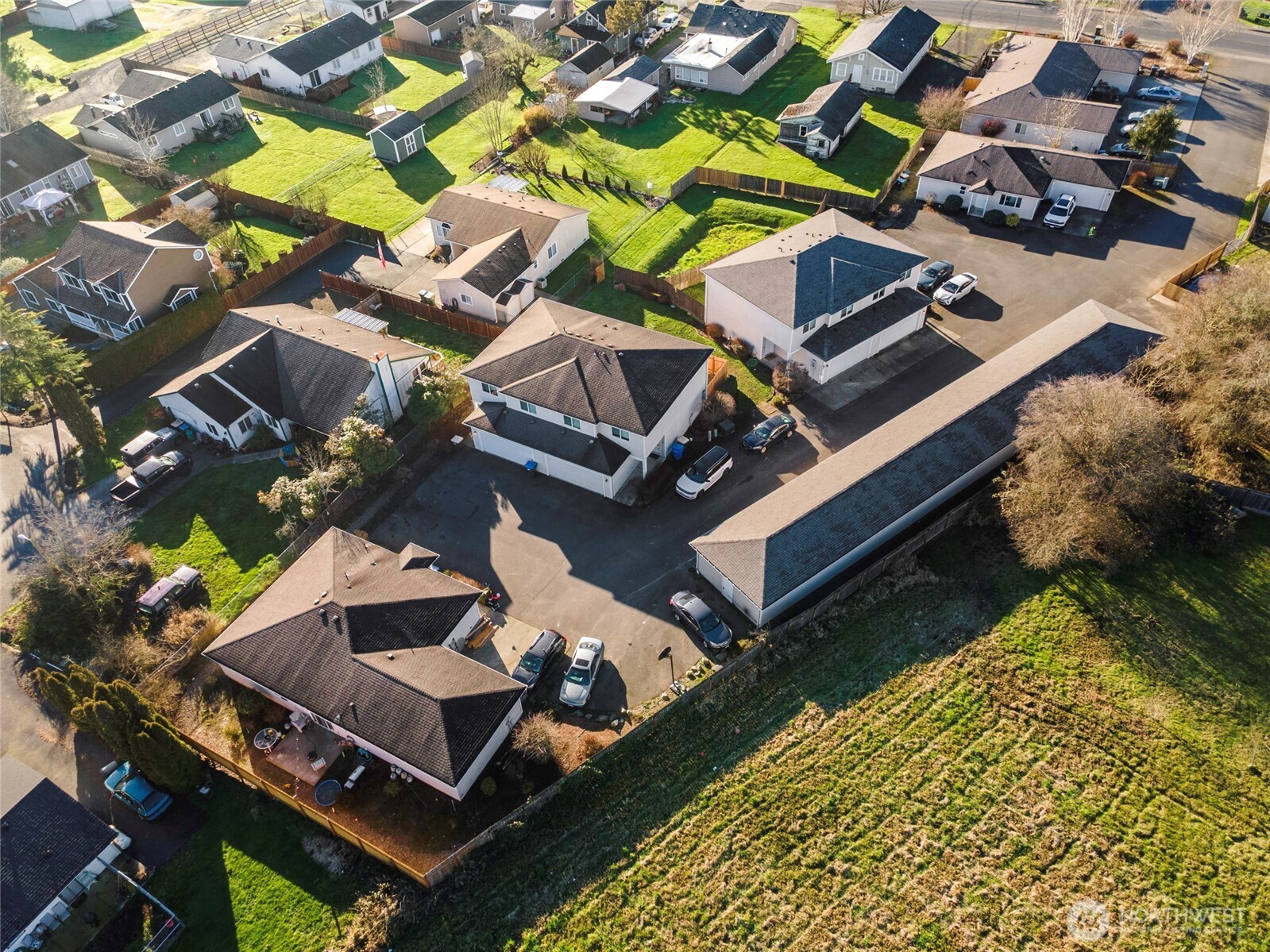 673 Southwest 20th Street Chehalis, WA 98532 - Photo 2 of 17 an aerial view of a house with a swimming pool patio and outdoor seating