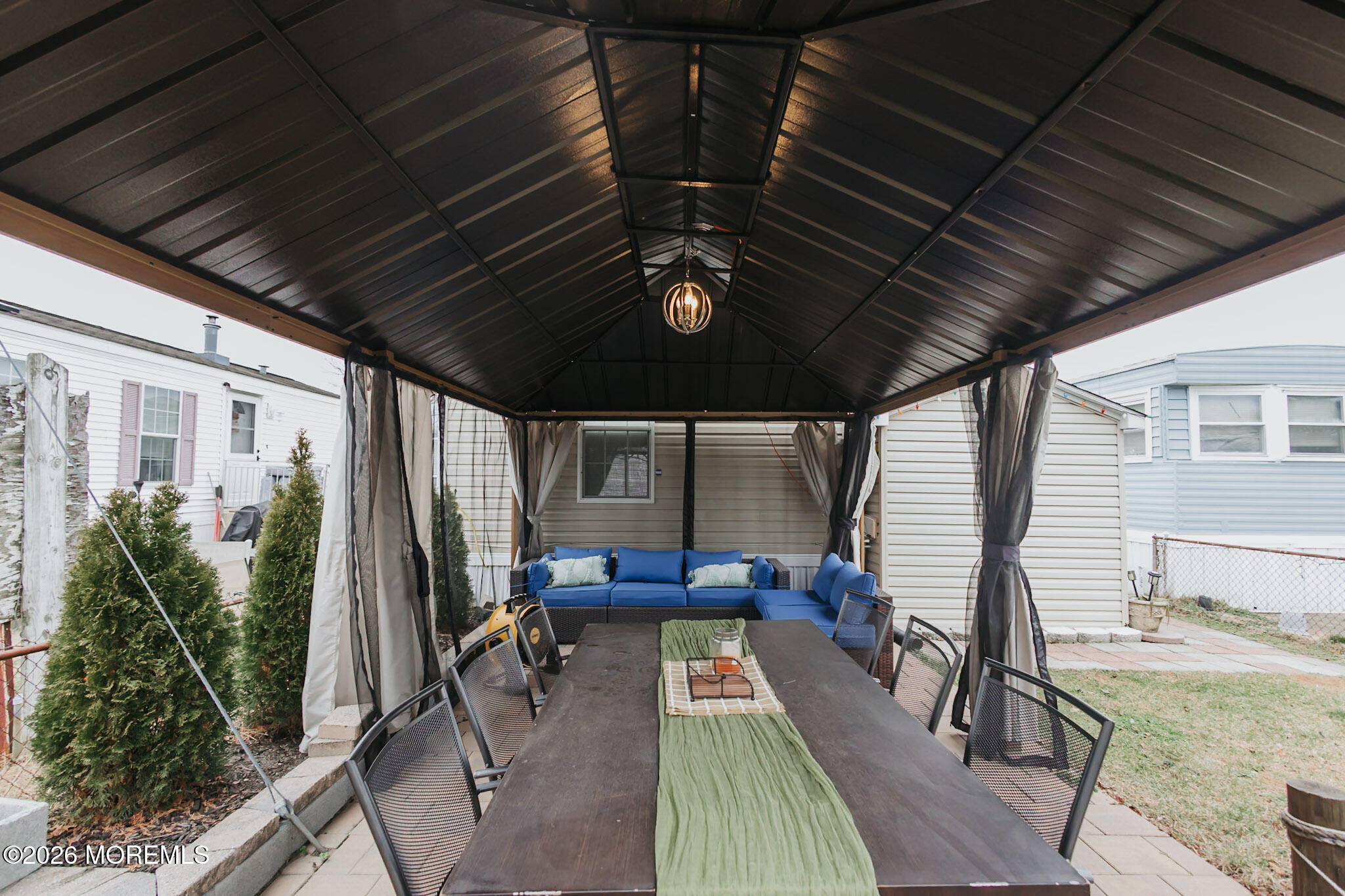 14 Locust Grove Hazlet, NJ 07730 - Photo 23 of 25 a sitting area with furniture and potted plants