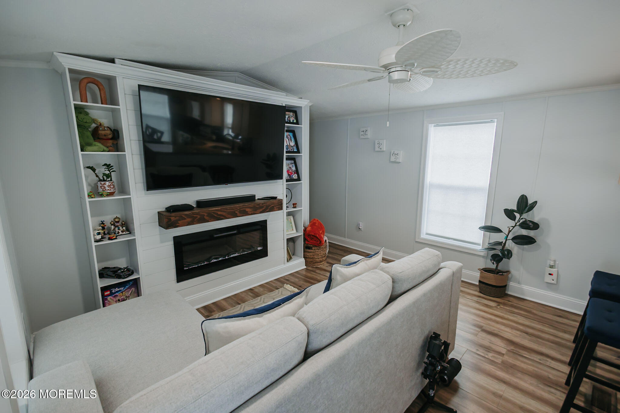 14 Locust Grove Hazlet, NJ 07730 - Photo 3 of 25 a living room with furniture and a flat screen tv