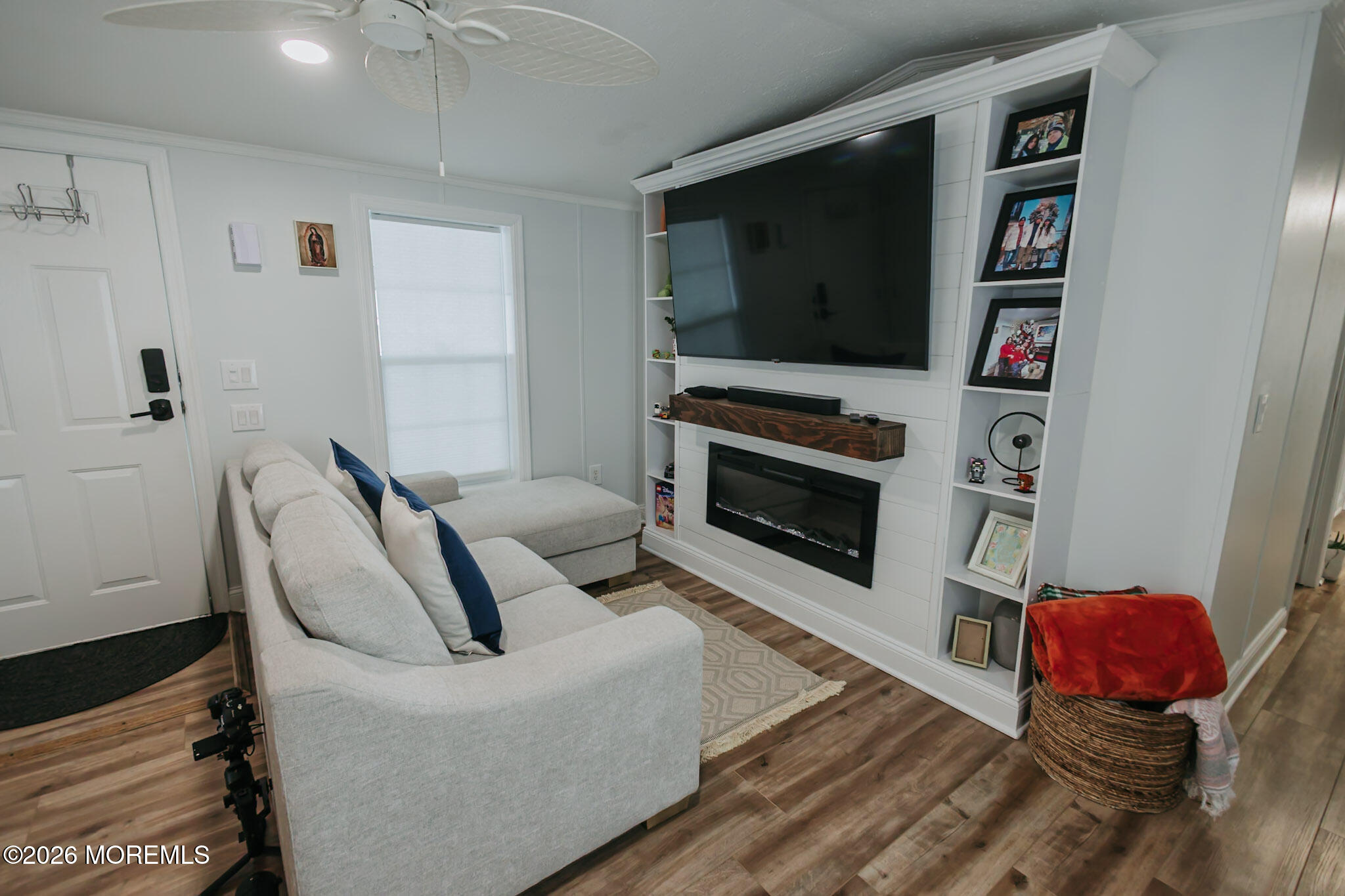 14 Locust Grove Hazlet, NJ 07730 - Photo 5 of 25 a living room with furniture and a flat screen tv