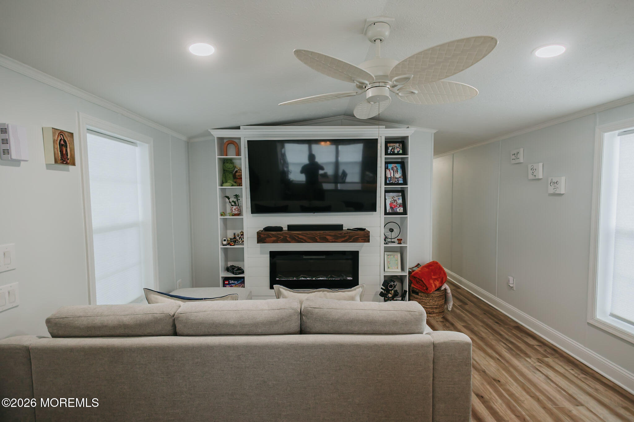 14 Locust Grove Hazlet, NJ 07730 - Photo 6 of 25 a living room with furniture and a fireplace