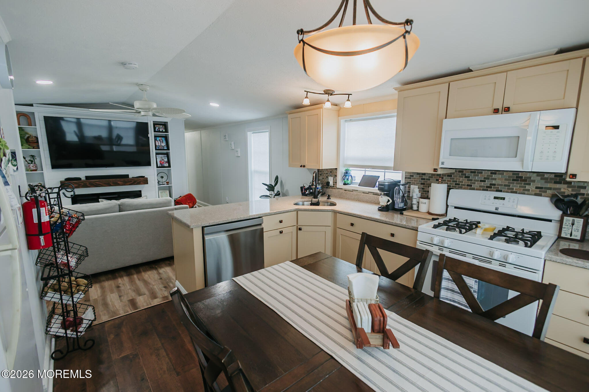 14 Locust Grove Hazlet, NJ 07730 - Photo 9 of 25 a kitchen with a stove a sink and a refrigerator