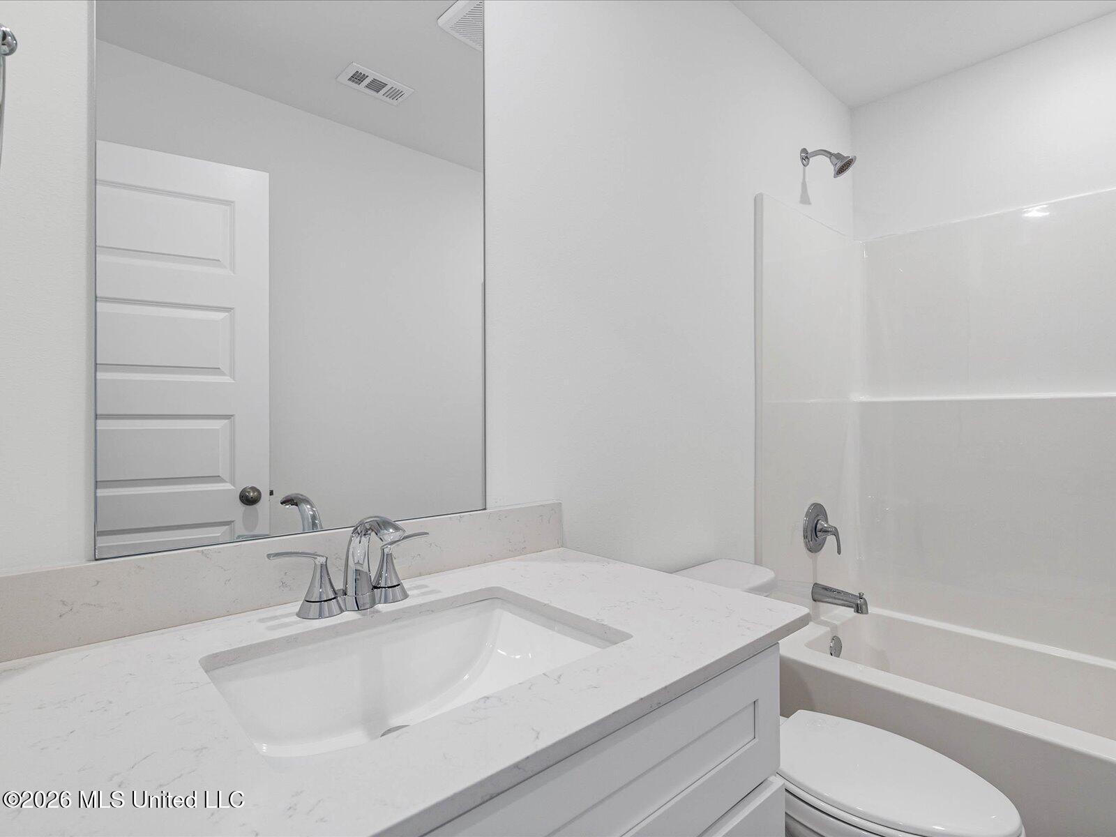8001 Buttonbush Road Biloxi, MS 39532 - Photo 2 of 27 GLF_PalmettoPointe_Carolina_Best_Bath3_3