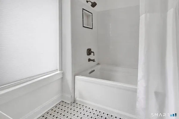 a bathroom with a bathtub