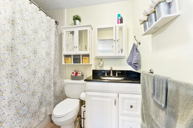 a room with furniture and a flat screen tv