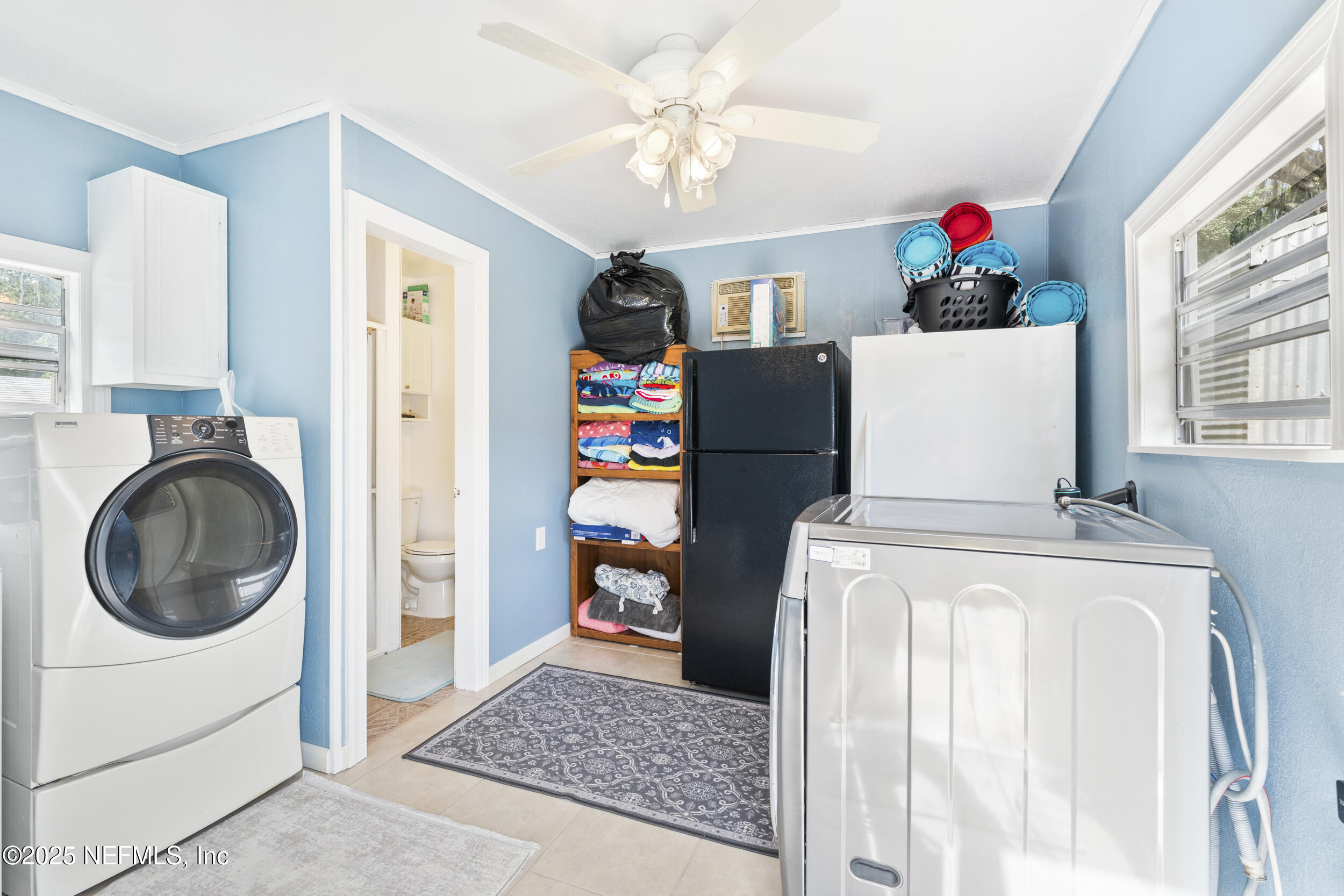 155 Tompkins Road Pomona Park, FL 32181 - Photo 18 of 38 a utility room with dryer and washer