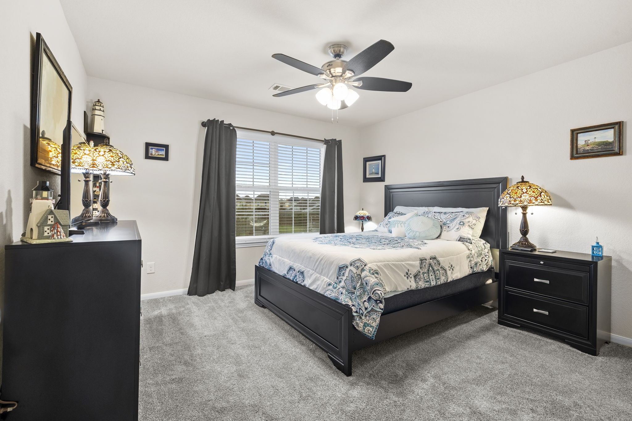 10710 Chestnut Path Way Tomball, TX 77375 - Photo 12 of 26 a bedroom with a bed and window