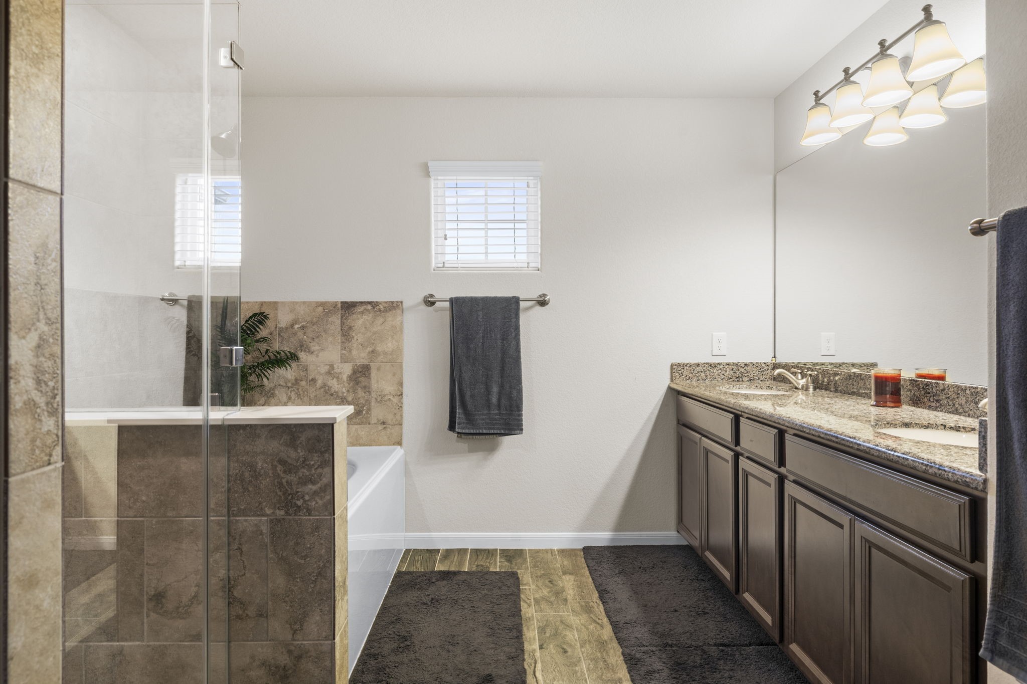 10710 Chestnut Path Way Tomball, TX 77375 - Photo 16 of 26 a kitchen with a sink and a refrigerator