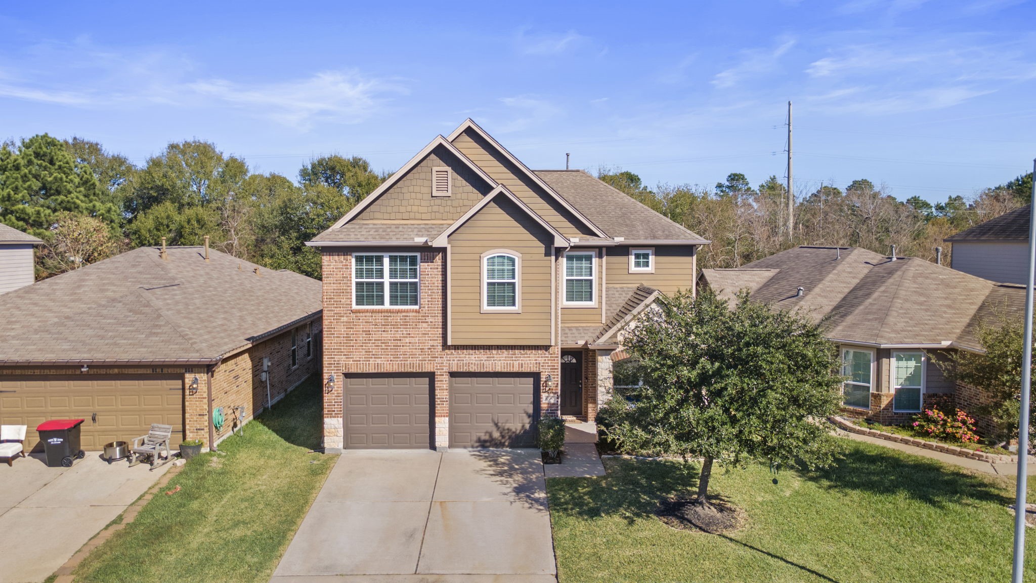 10710 Chestnut Path Way Tomball, TX 77375 - Photo 23 of 26 a aerial view of a house next to a yard