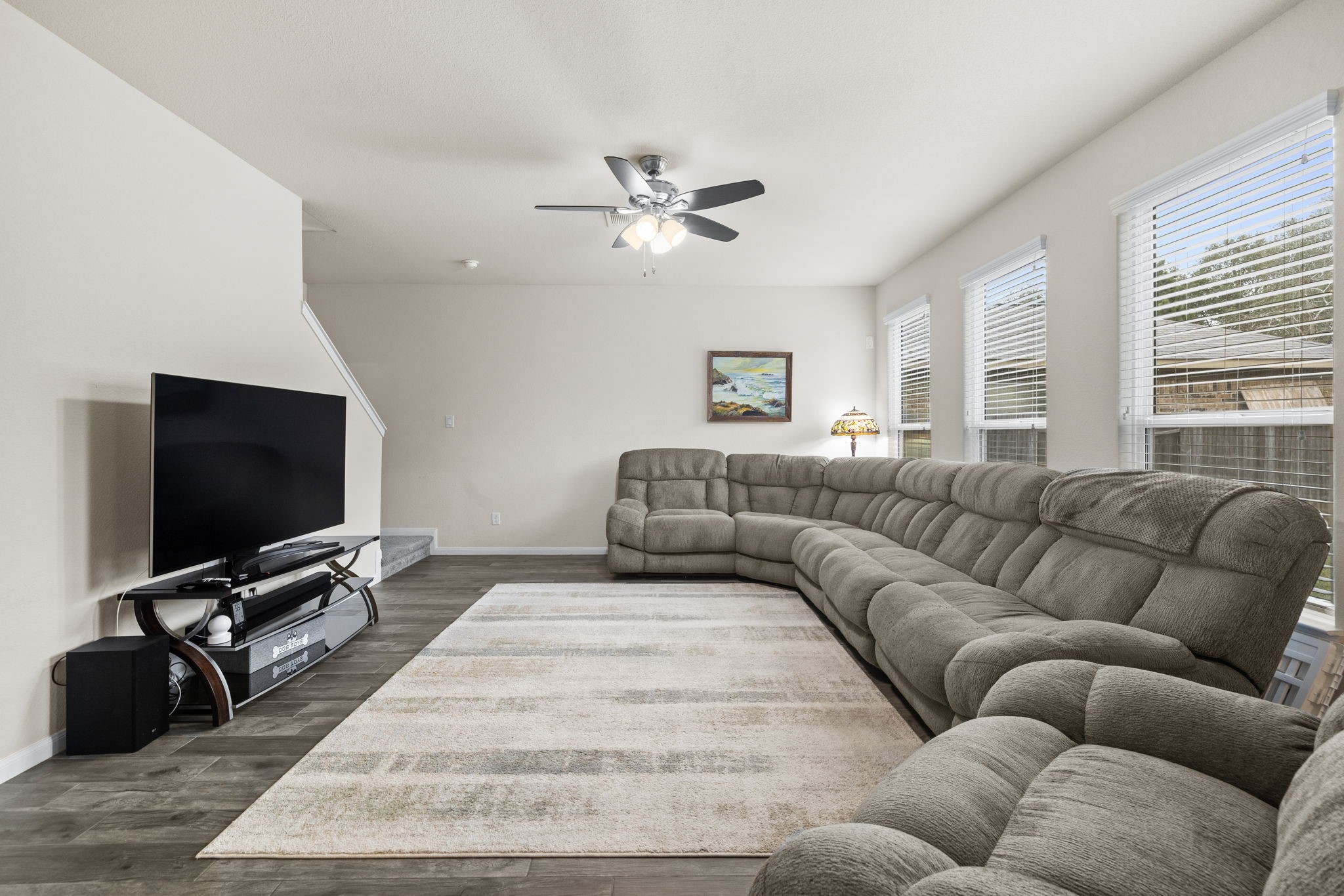 10710 Chestnut Path Way Tomball, TX 77375 - Photo 7 of 26 a living room with furniture and a flat screen tv