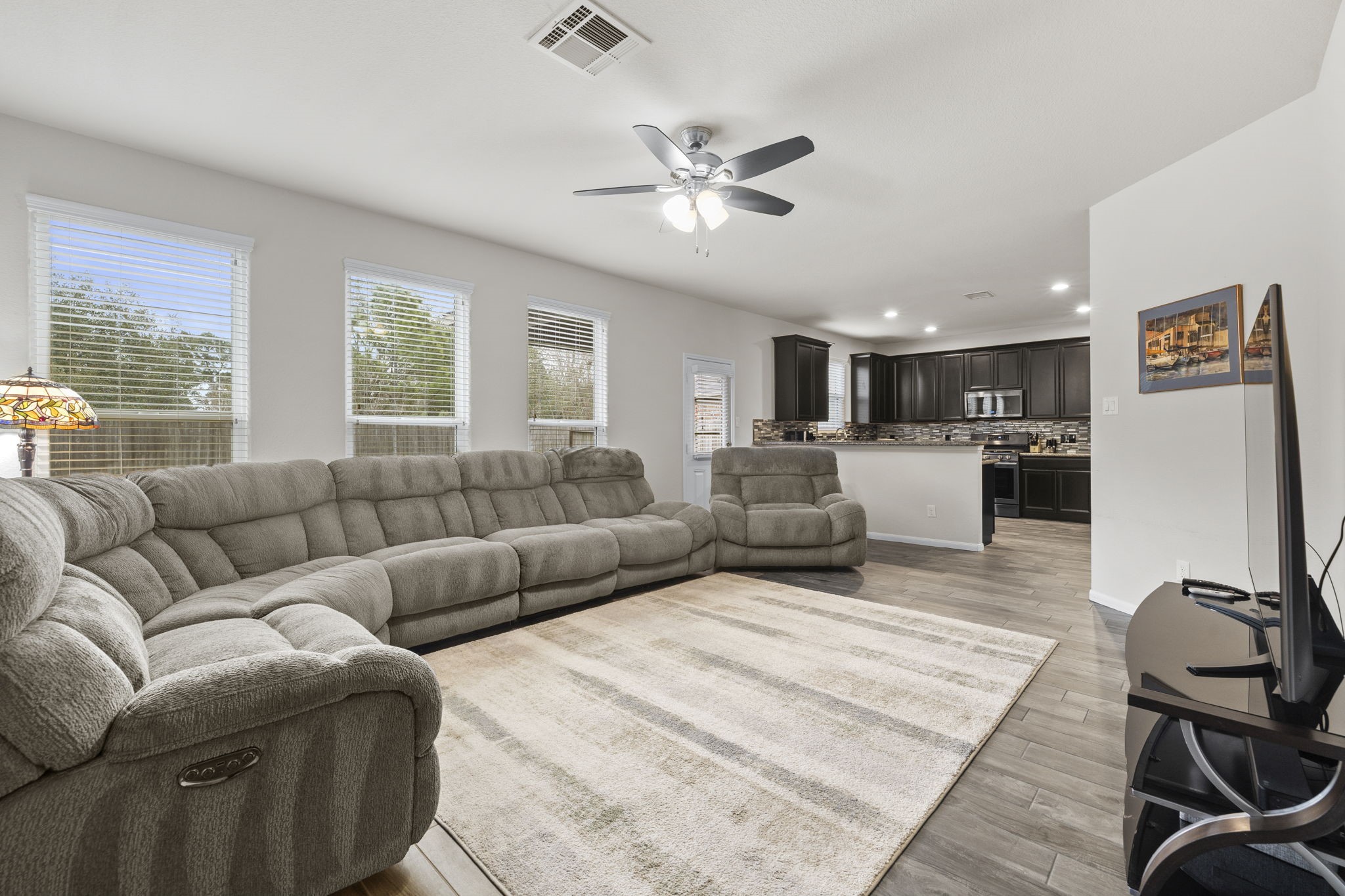 10710 Chestnut Path Way Tomball, TX 77375 - Photo 8 of 26 a living room with furniture and a large window