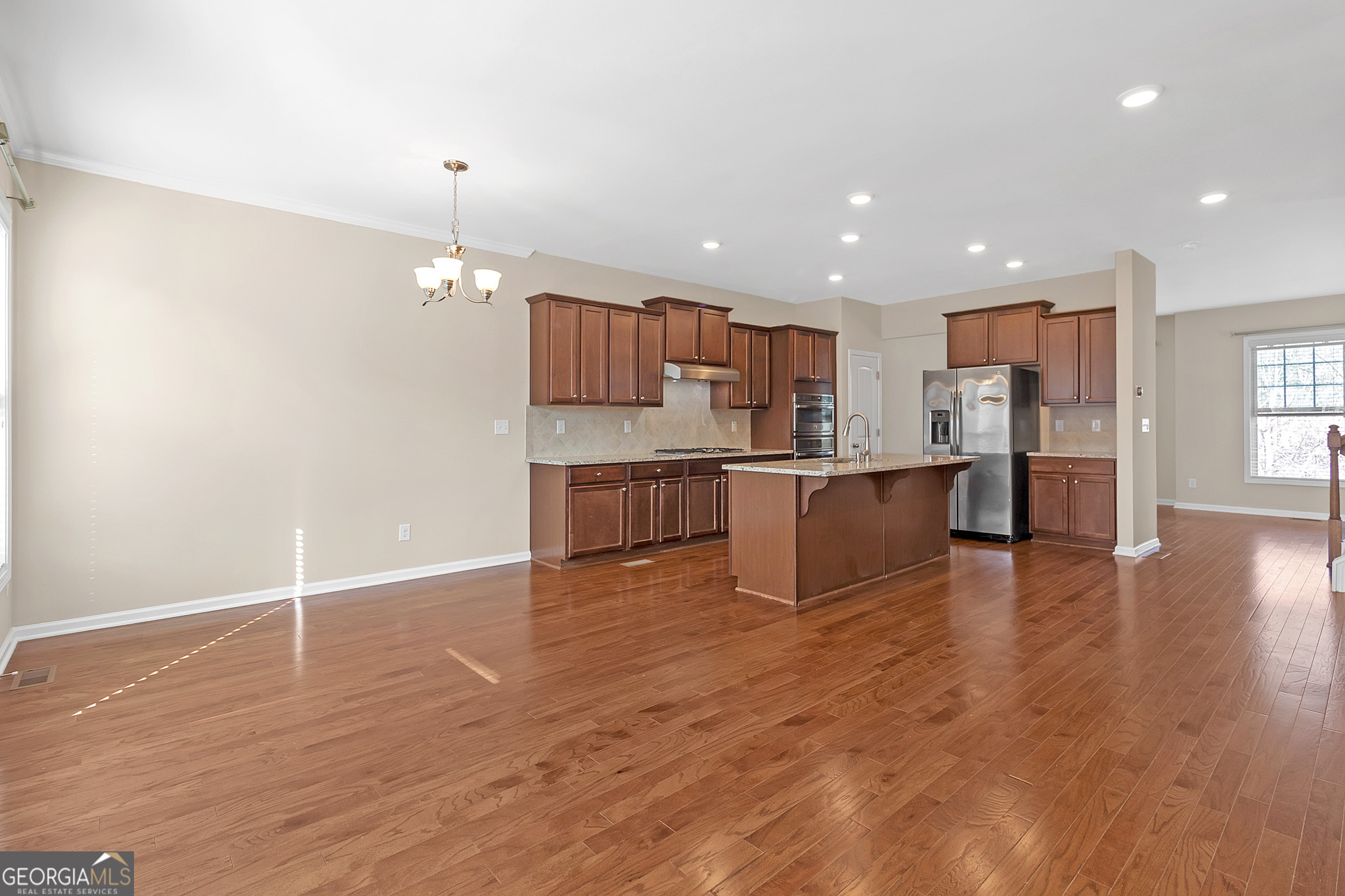 836 Ivy Vine Way Milton, GA 30004 - Photo 7 of 16 a view of kitchen with wooden floor