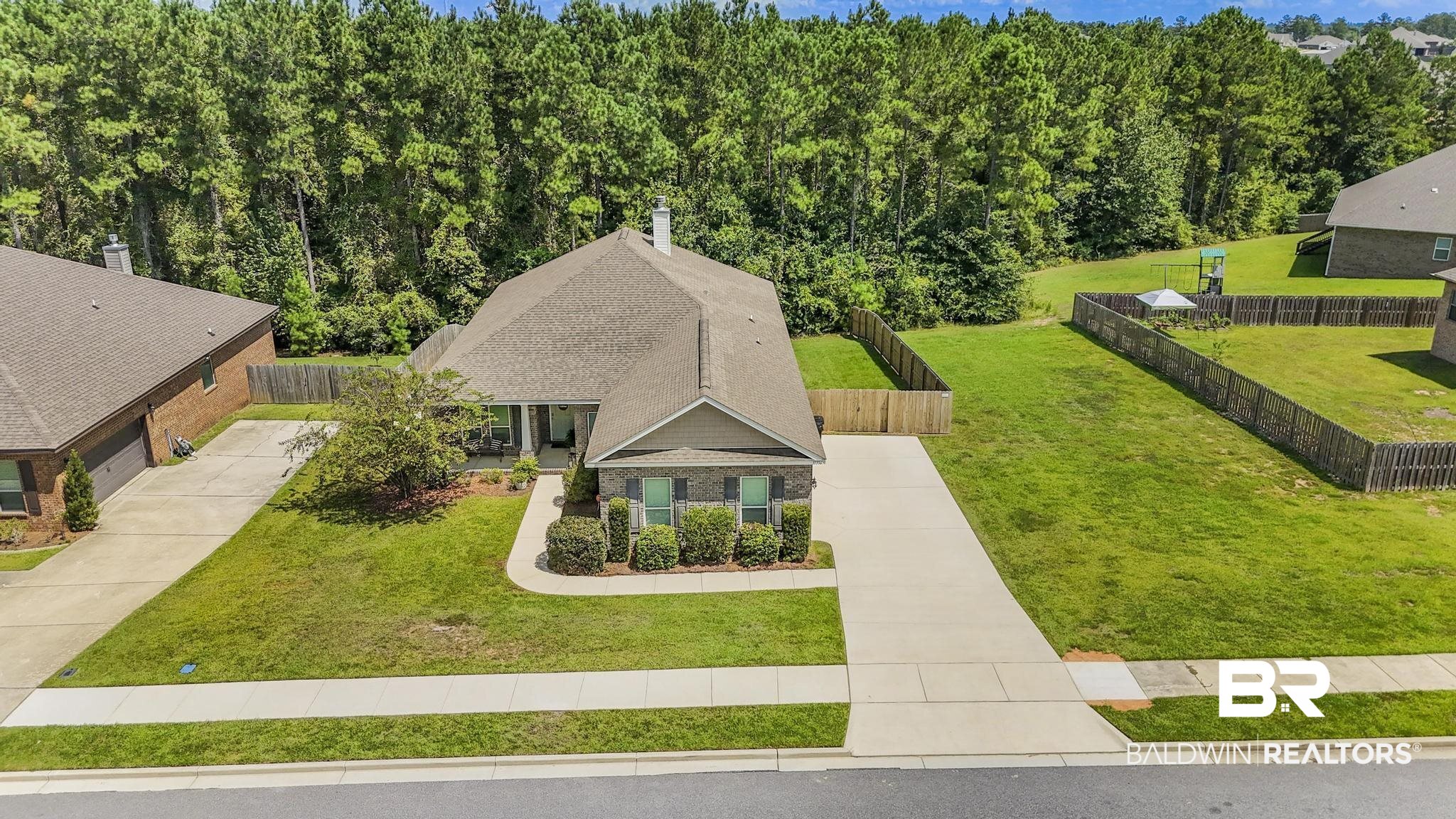 31336 Hoot Owl Road Daphne, AL 36527 - Photo 27 of 36 View from above of property featuring a heavily wooded area