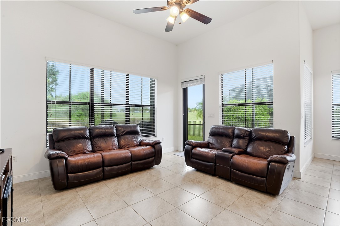 5355 Ferrari Avenue Ave Maria, FL 34142 - Photo 11 of 28 a living room with furniture and a large window