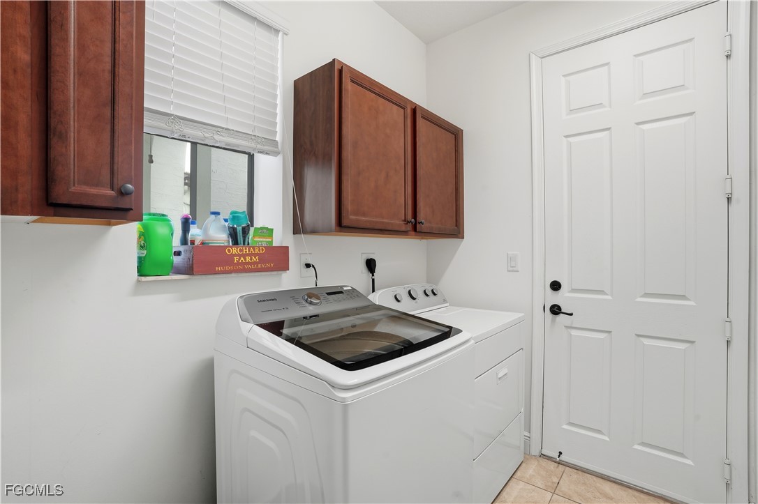 5355 Ferrari Avenue Ave Maria, FL 34142 - Photo 23 of 28 a kitchen with a sink cabinets and window