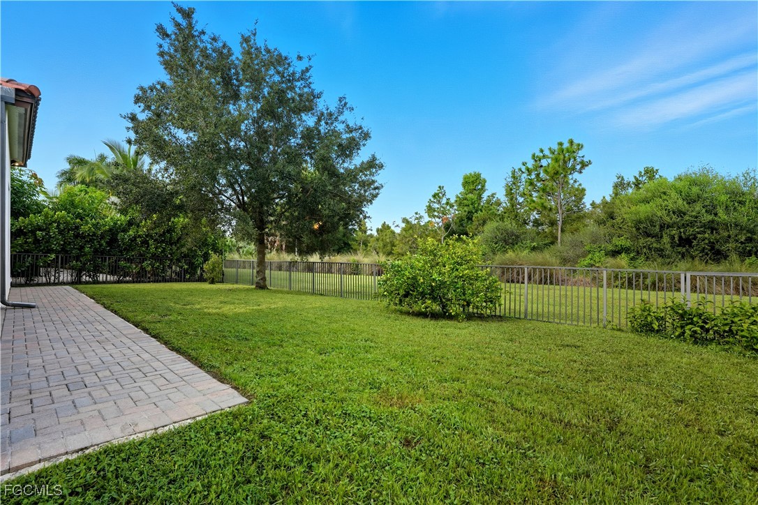 5355 Ferrari Avenue Ave Maria, FL 34142 - Photo 26 of 28 a view of a park with large trees