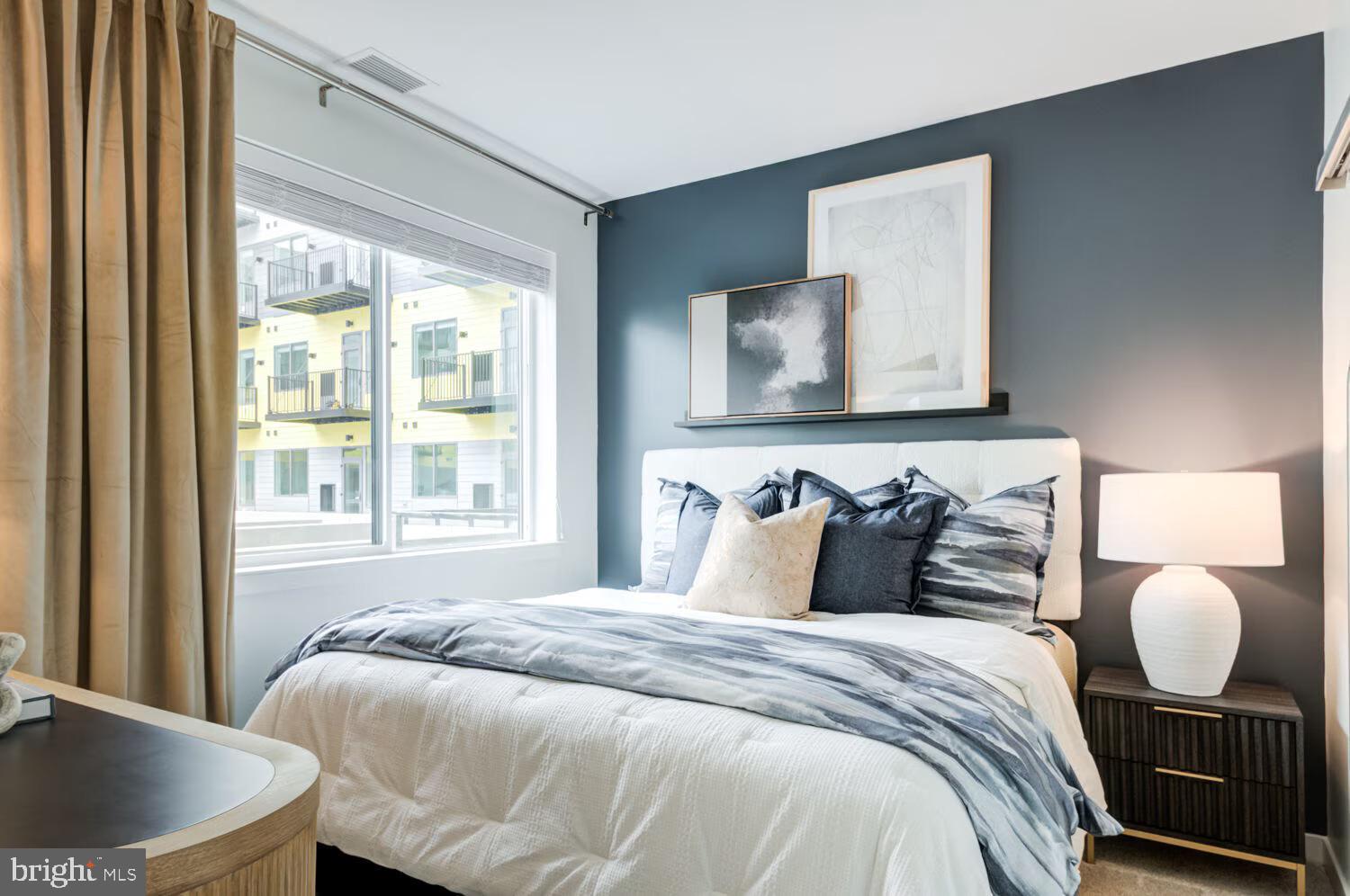 501-31 North Christopher Columbus Boulevard, Unit 2524 Philadelphia, PA 19123 - Photo 10 of 38 a bedroom with a bed and window