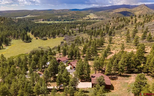 a view of a city with mountains in the background