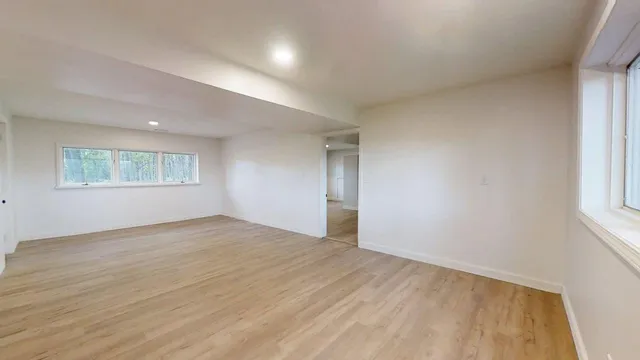 a backyard of a house with lots of green space