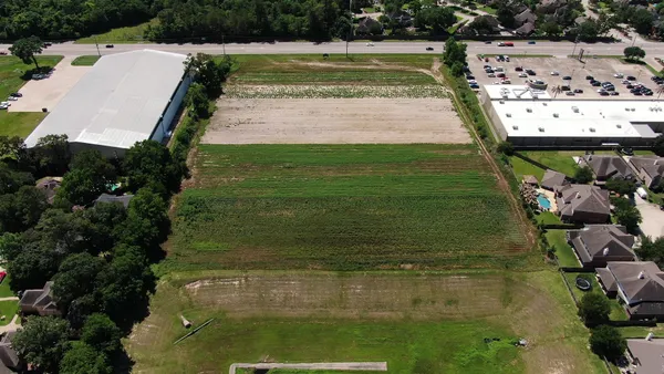 a view of a garden with an outdoor space