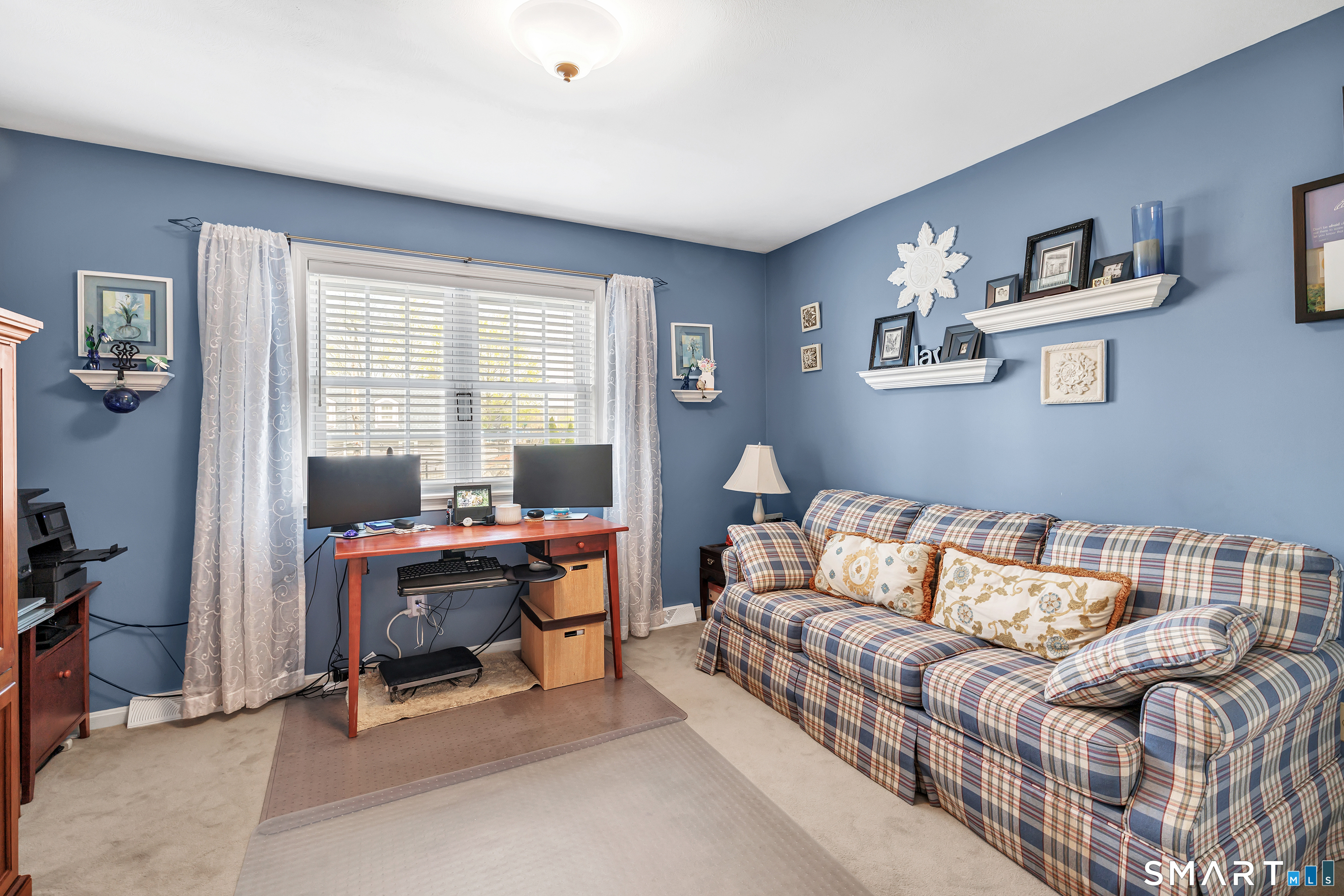 146 Howe Avenue, Unit 146 Shelton, CT 06484 - Photo 28 of 35 a living room with furniture rug and a window
