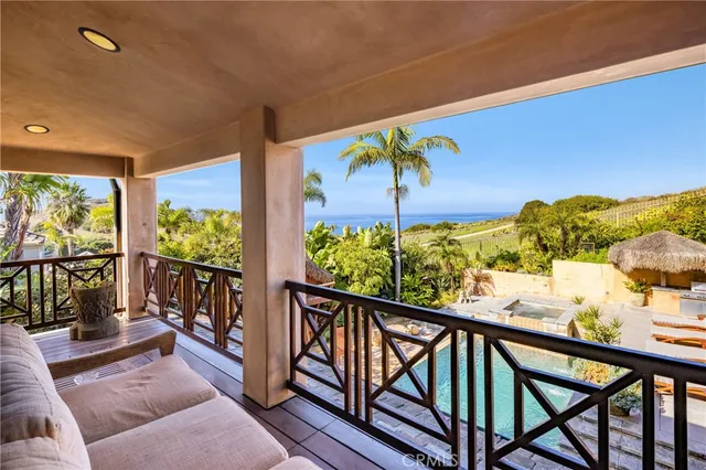 a view of balcony with furniture