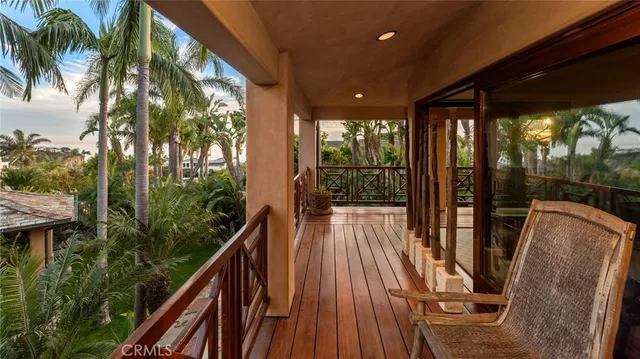 a view of balcony with furniture