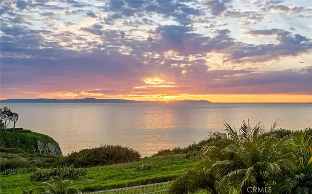 a view of a lake from a yard