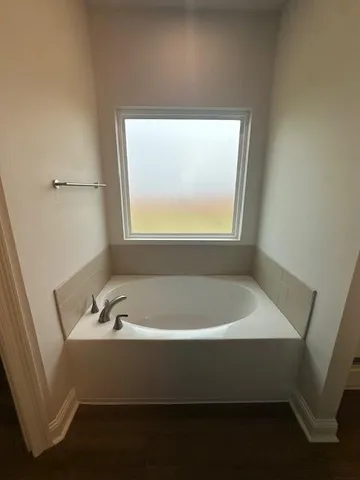 a bathroom with a bathtub