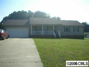 4037 Davis Road Maiden, NC 28650 - Photo 2 of 4 a backyard of a house