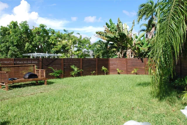 a view of a bench in the garden