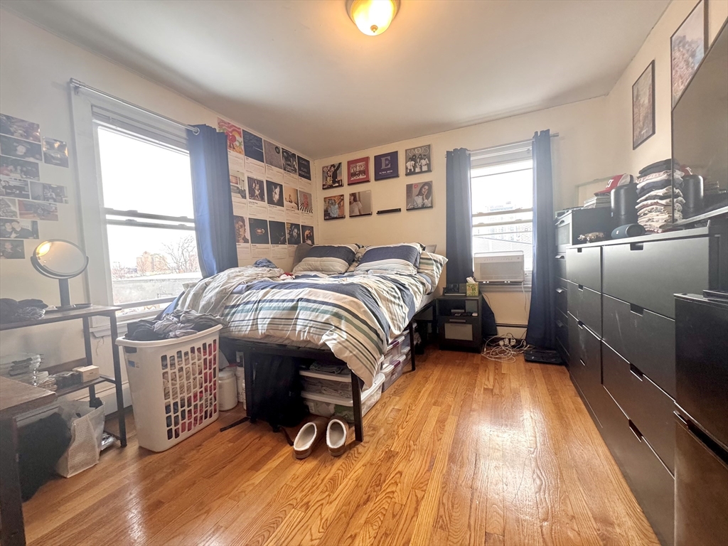 74 Ashford Street, Unit 2 Boston, MA 02134 - Photo 16 of 23 a bedroom with a bed and a window