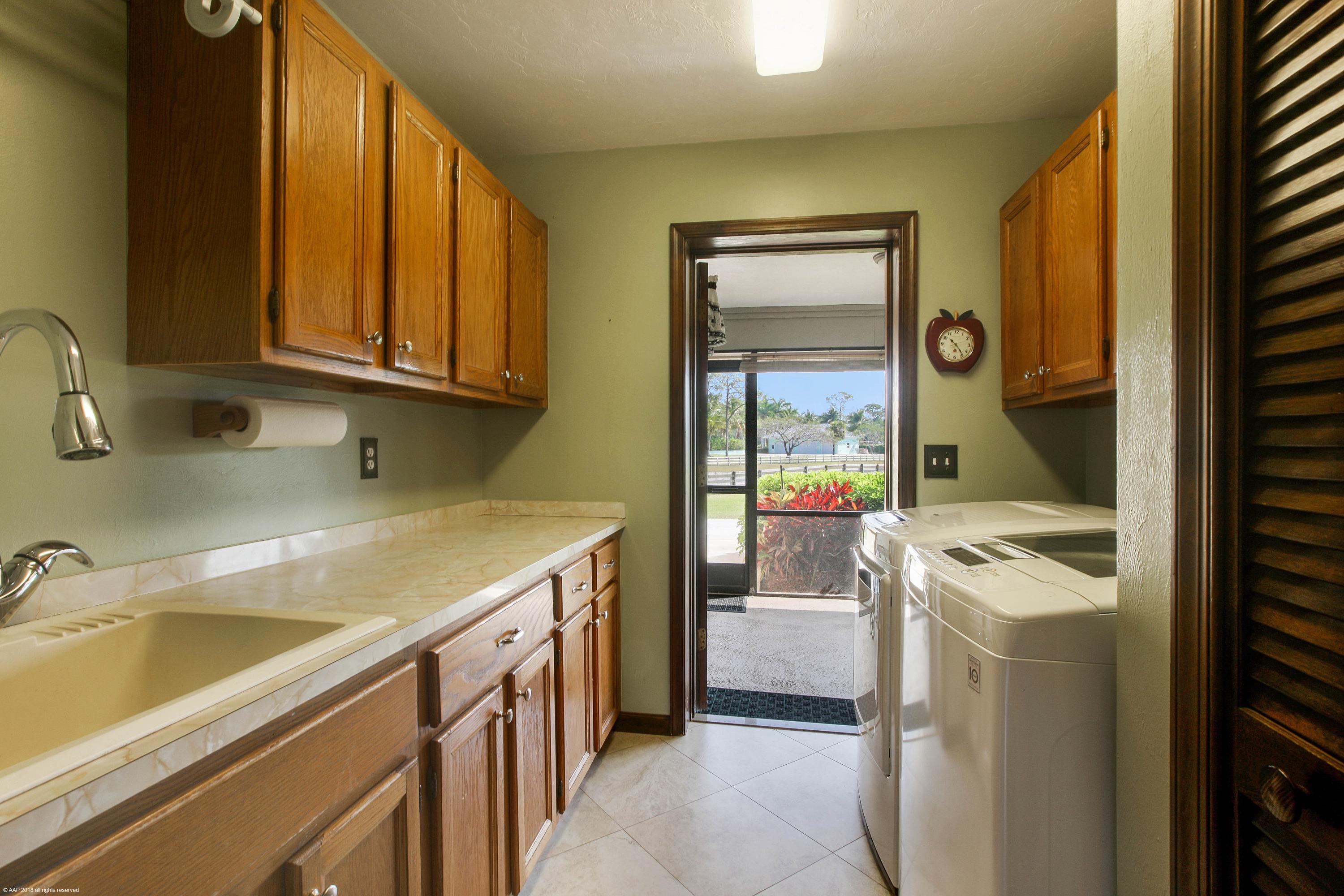 5968 Reynolds Road Lake Worth, FL 33449 - Photo 20 of 34 Laundry Room