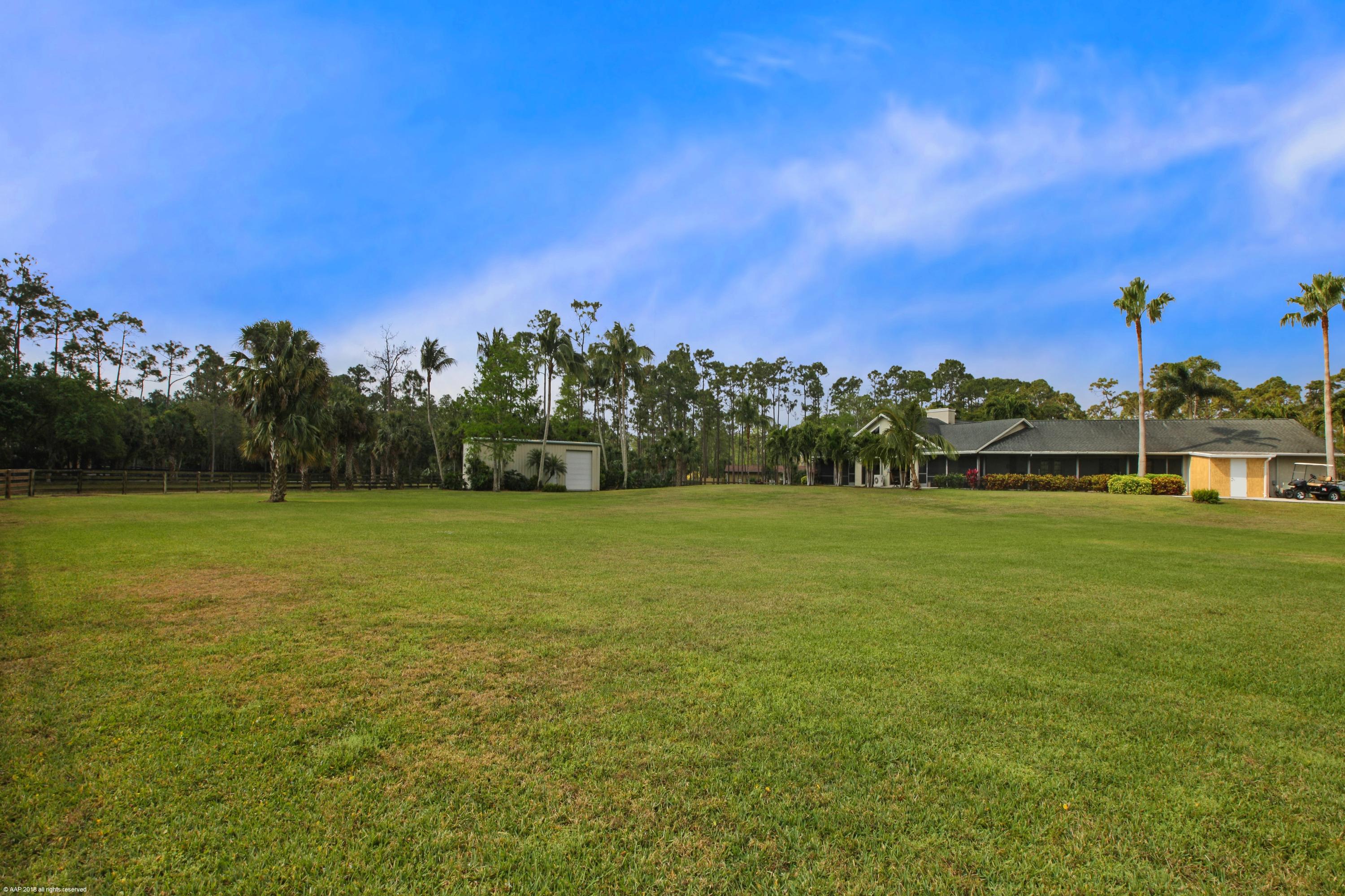 5968 Reynolds Road Lake Worth, FL 33449 - Photo 28 of 34 Backyard / Rear Elevation