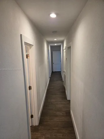 a view of hallway with stairs