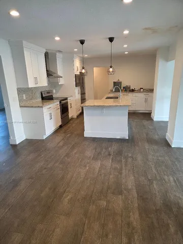 a bathroom with a sink and toilet