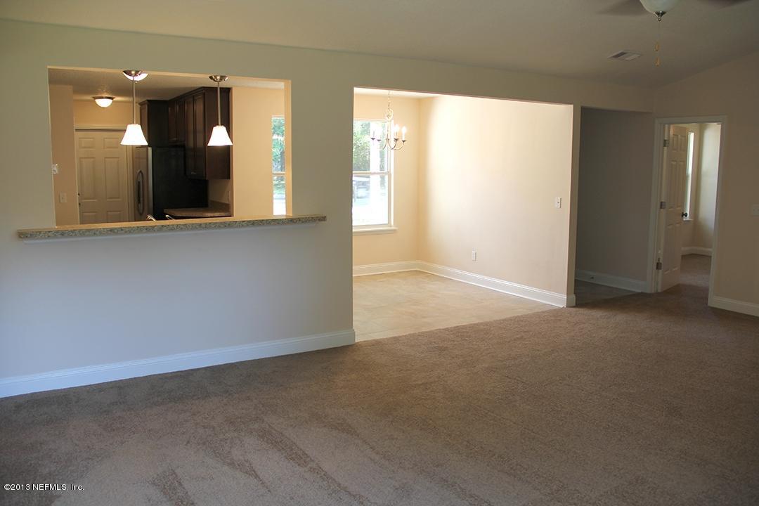 2128 Blair Road Jacksonville, FL 32221 - Photo 3 of 11 a view of an empty room with window and bathroom