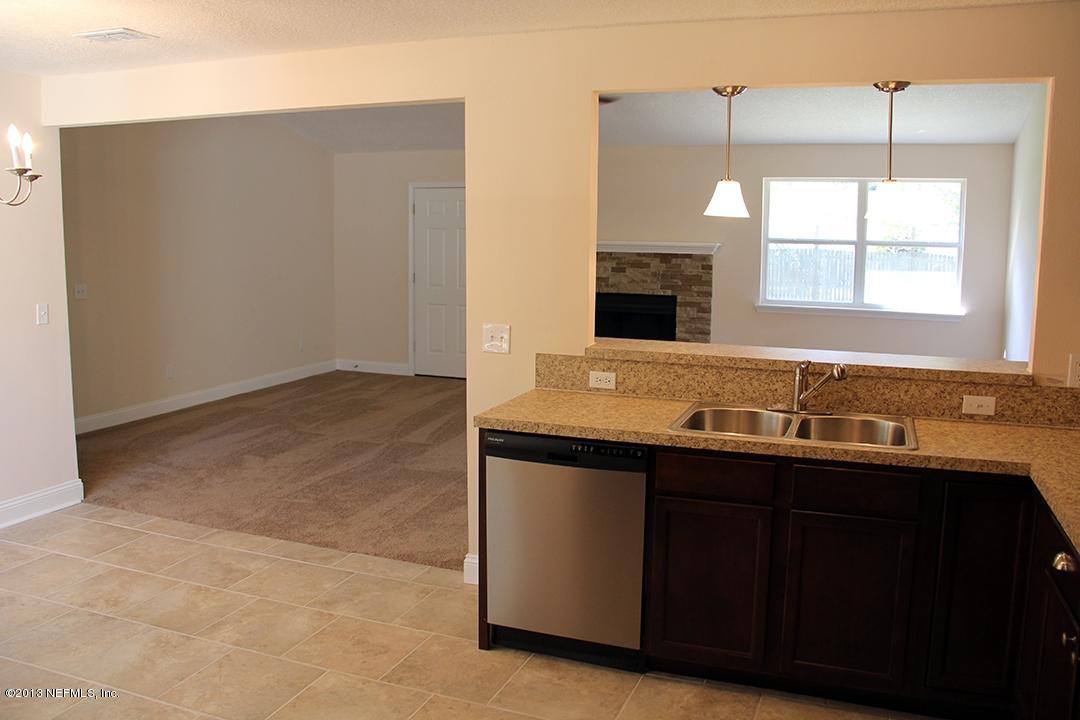 2128 Blair Road Jacksonville, FL 32221 - Photo 6 of 11 a bathroom with a sink and a mirror