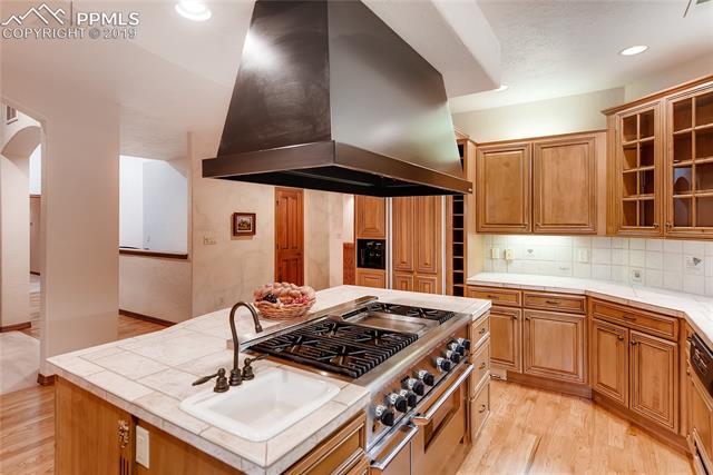 6155 Wilson Road Colorado Springs, CO 80919 - Photo 10 of 35 Thermador 6-burner range and double oven with prep sink