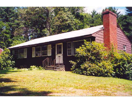 39 Farquhar Road Sturbridge, MA 01566 - Photo 1 of 1 a front view of a house with a yard