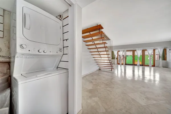 a view of a house with a yard and plants