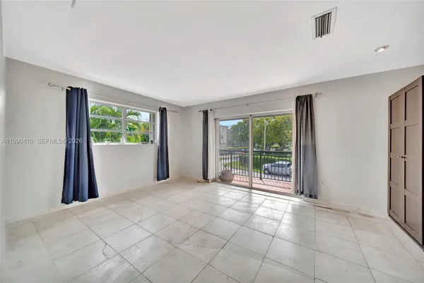 an aerial view of a house with a garden view