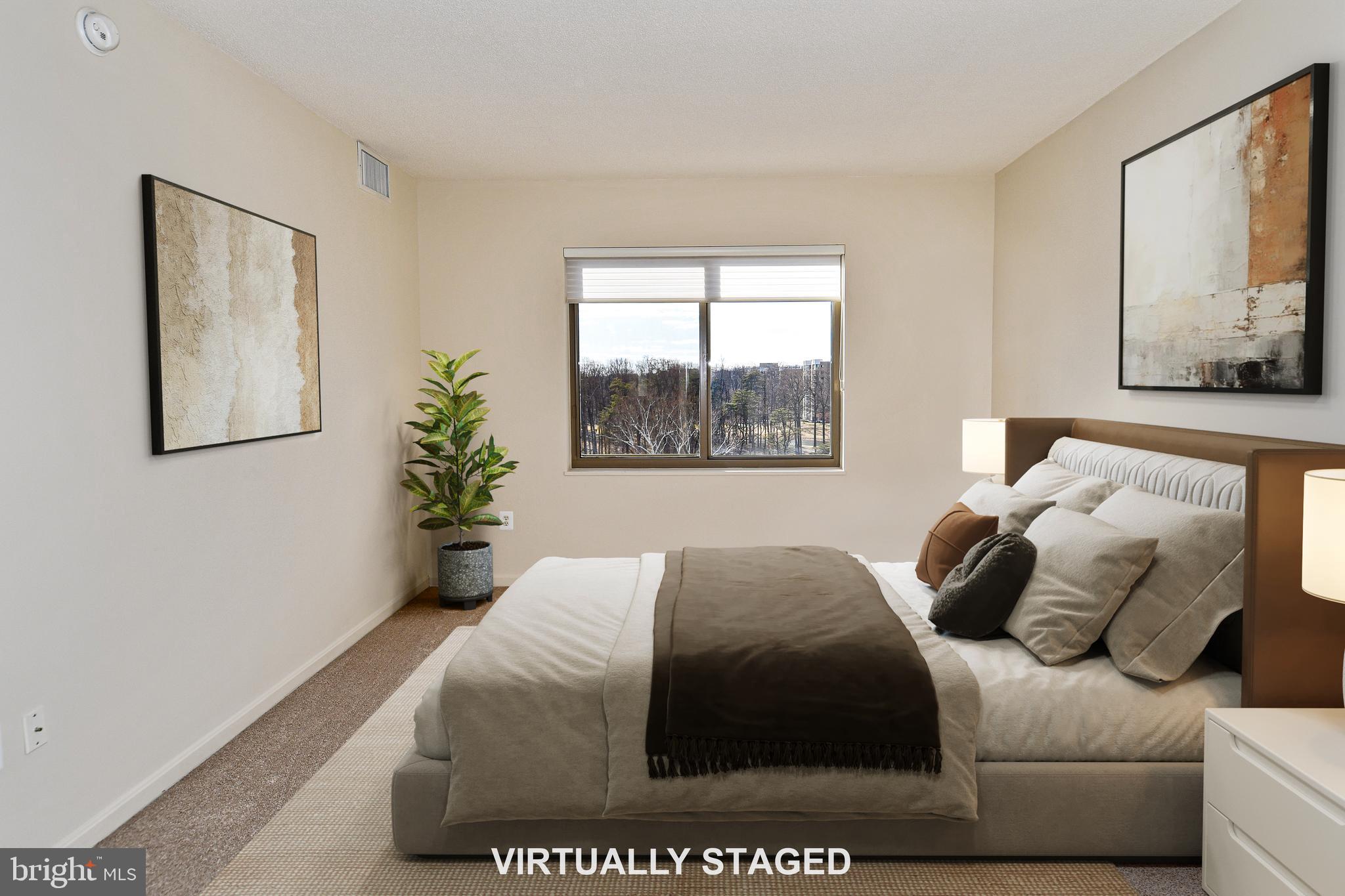 3100 North Leisure World Boulevard, Unit 801 Silver Spring, MD 20906 - Photo 31 of 69 a bedroom with a bed and a window