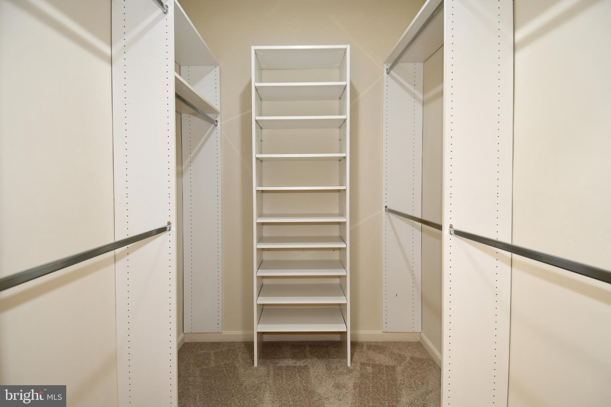 3100 North Leisure World Boulevard, Unit 801 Silver Spring, MD 20906 - Photo 37 of 69 a view of walk in closet with empty racks