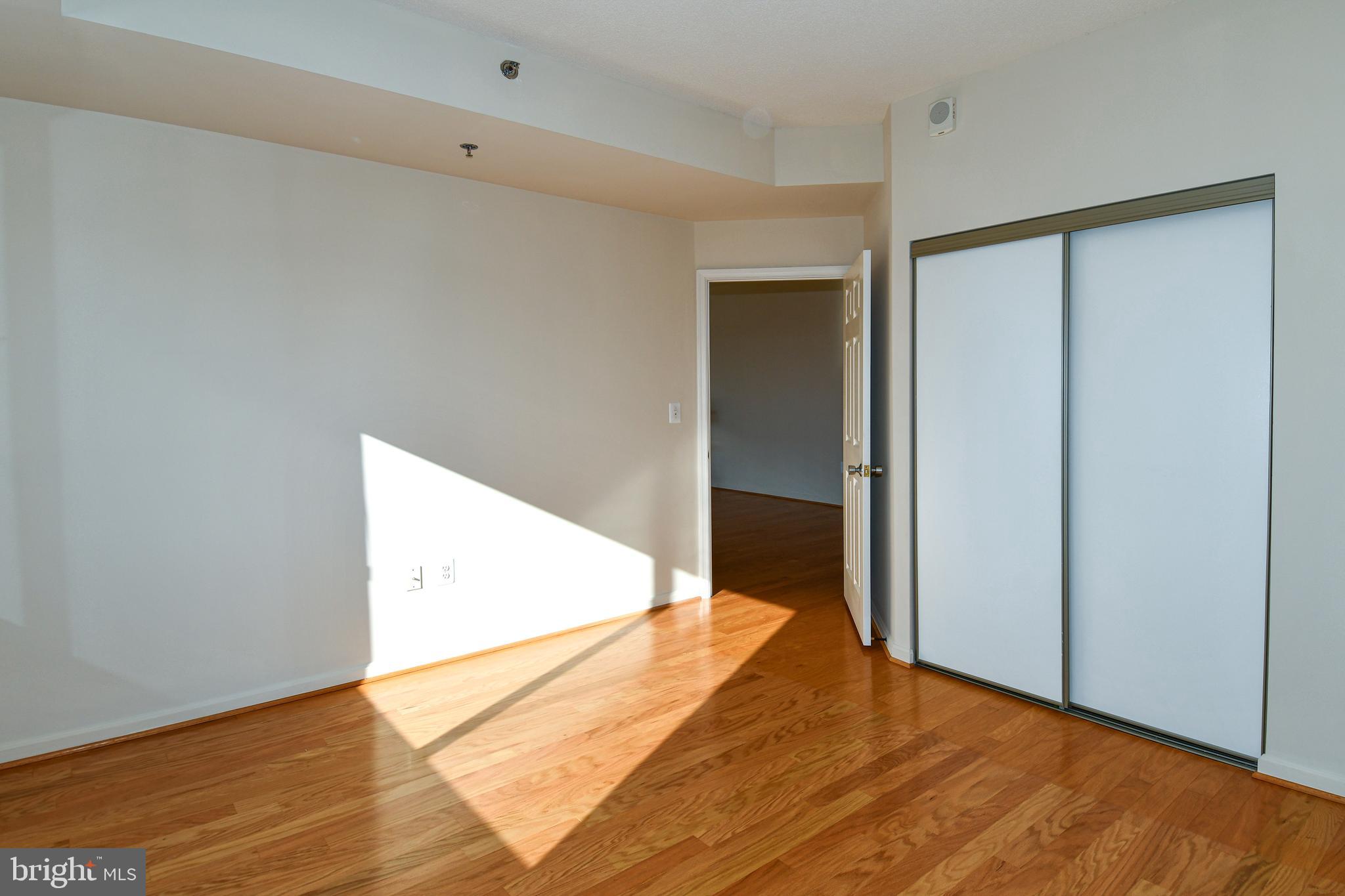 3100 North Leisure World Boulevard, Unit 801 Silver Spring, MD 20906 - Photo 43 of 69 a view of hallway with wooden floor
